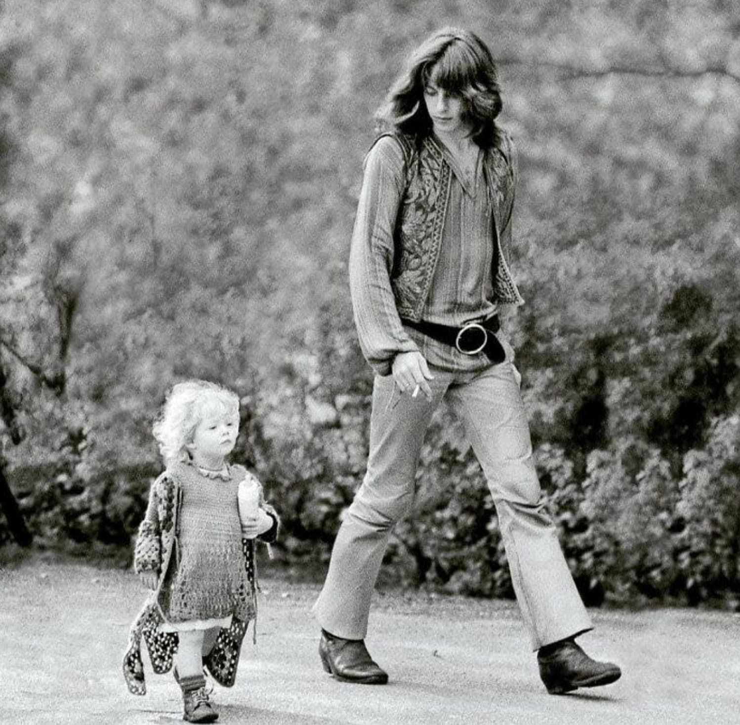 “Hippie dad walking with his daughter. Amsterdam,1968.”